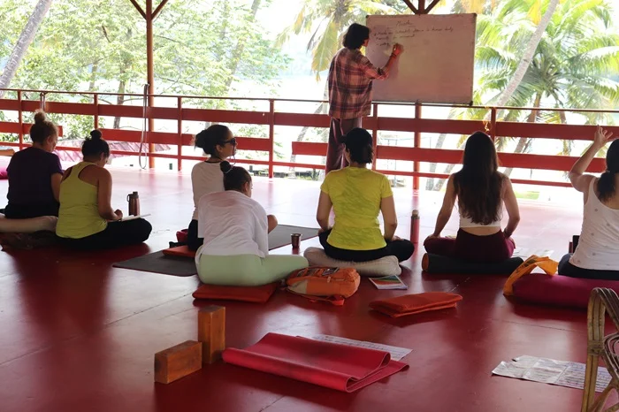 yoga guru teaching about proper alignmen