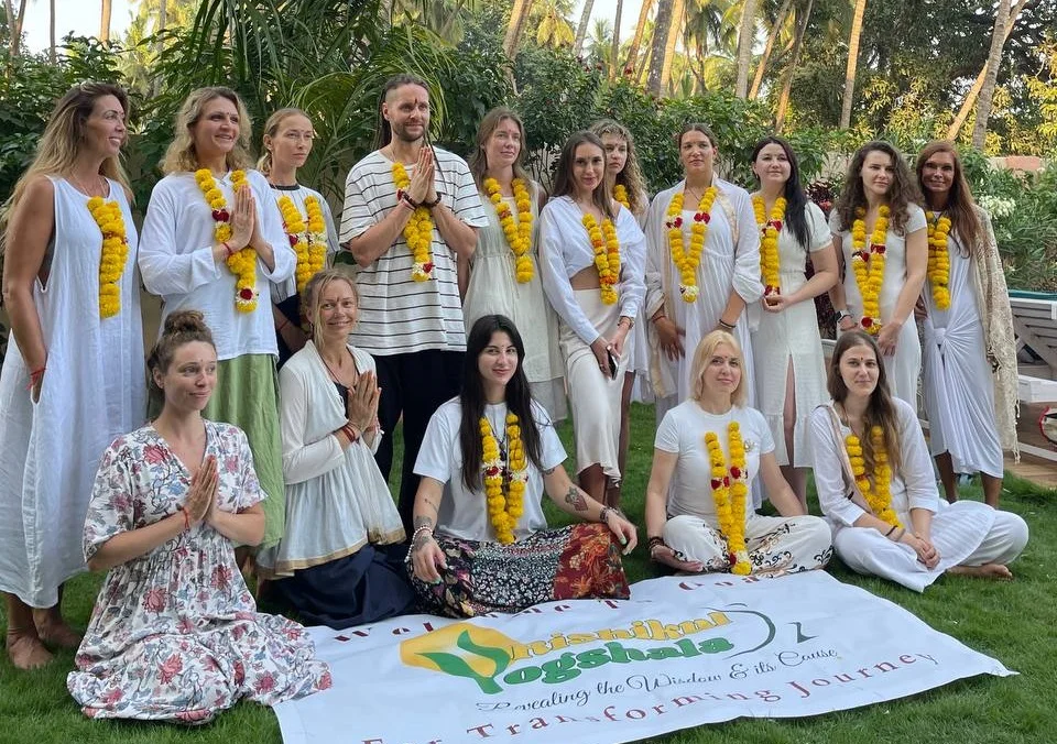 Rishikul Yogshala students posing after Yoga Teacher Training ceremony