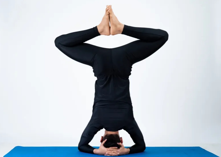 Premium Photo | Man practicing balance yoga pose