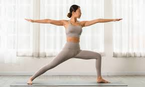 yoga student practicing a balancing asana