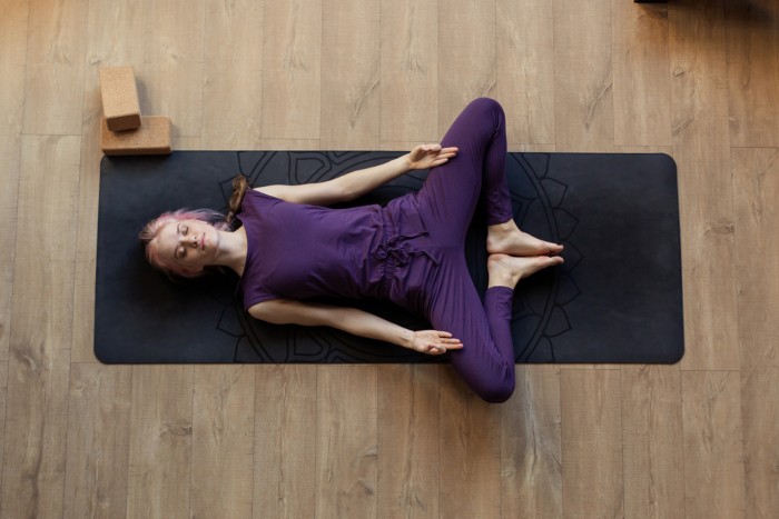 Supta Baddha Konasana (Reclining Bound Angle Pose)