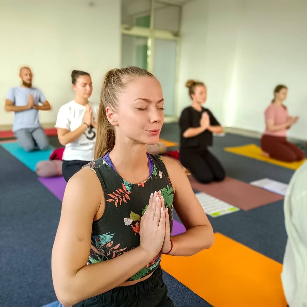 Group Practicing Yoga at Yoga Teacher Training Centre