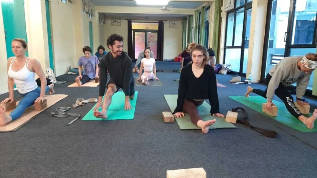 Group Practicing Yoga at Yoga Teacher Training Centre